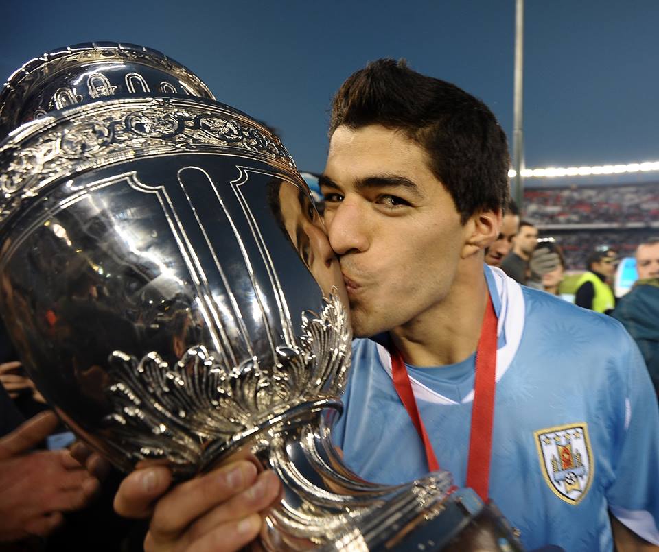 Luis Suarez celebrating Uruguay's 2011 Copa America triumph